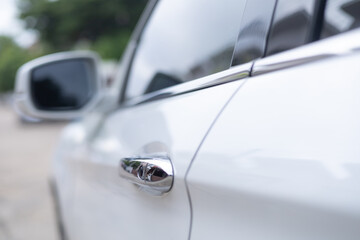 Close-up of a white car door. Automotive concept. opening doors, concept cars, driving safely