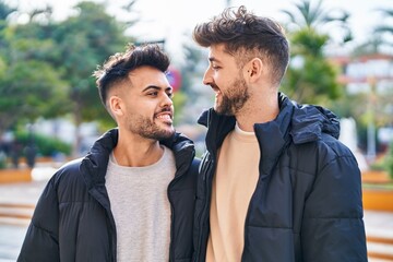 Young couple smiling confident standing together at park