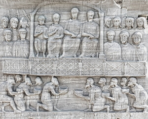 Submission of the barbarians scene at the hippodrome of Constantinople. Marble relief of west face of pedestal of the Obelisk of Theodosius (series). Sultan Ahmet square, Istanbul, Turkey