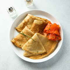 Homemade crepes with smoked salmon