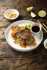 Rice noodles with pork and peanut