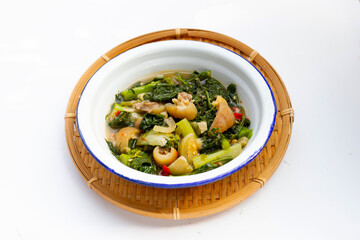 Thai spicy soup with pork skin and vegetables