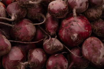 Wet beets at a farmers market.