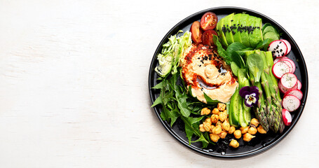 Healthy vegetarian, vegan dish with vitamins, antioxidants, protein, fiber  on light background.