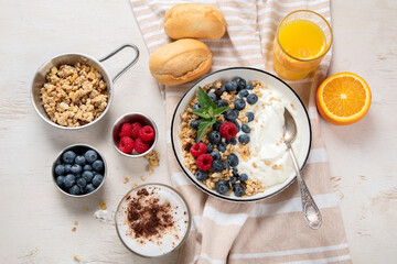 Healthy breakfast, cereal with berries and yogurt.