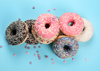 Glazed colored donuts.