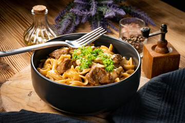 Tagliatelle mosse with beef sauce.