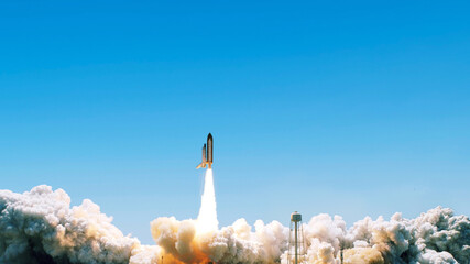Spaceship rocket shuttle with clouds of smoke successfully takes off in the blue sky. Rocket lift...