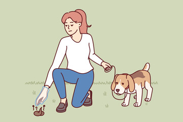 Woman walks dog with poop bag and picks up feces from ground, taking care of purity of nature. Young girl with dog on leash is in park and cleans after pet, showing civic awareness