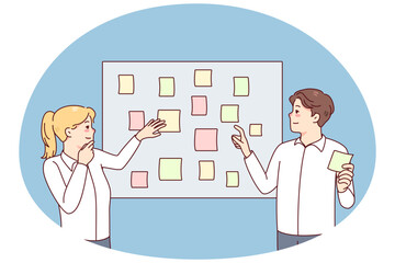 Employees brainstorm engaged in creative thinking in office. Businesspeople work with sticker planning tasks together at meeting. Teamwork concept. Vector illustration.