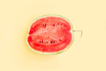 Watermelon fruit sliced half  isolated on yellow background, Organic fruit, Ripe watermelon