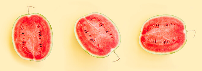 Watermelon fruit sliced half  isolated on yellow background, Organic fruit, Ripe watermelon