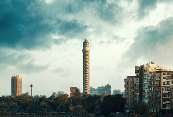 Egypt, Cairo - View of Nile River and Cairo Tower with Buildings, Zamalek, Sunset View. - obrazy, fototapety, plakaty