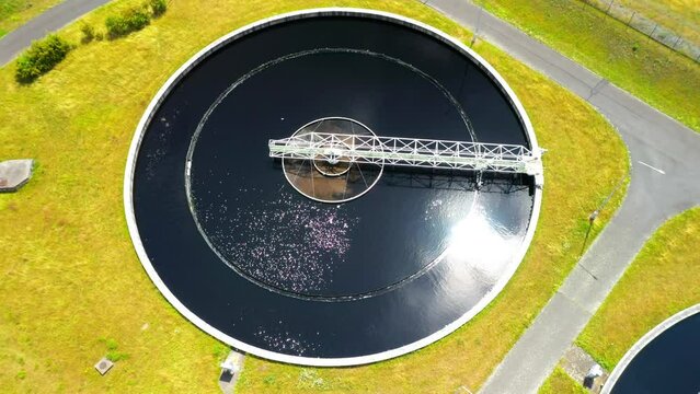 Sewage treatment plant from above. Grey water recycling. Waste management theme. Ecology and environment in European Union.