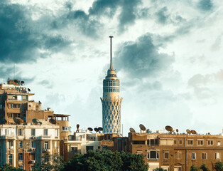 Fototapeta na wymiar Egypt, Cairo - Cairo Tower with Old Vintage Buildings in Zamalek, Sunset View.