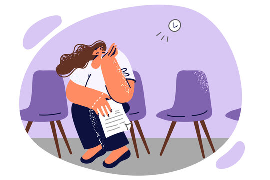 Bored woman with resume sits in corridor waiting for interview with HR manager in recruiting company