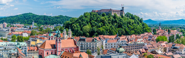 A panorama view over the rooftops towards the castle and riverside buildings in Ljubljana, Slovenia...