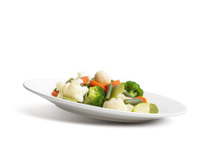 steamed vegetables on a white plate on a white background.