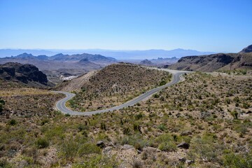 Majestic Journey: Lake Mead Road near Las Vegas, Embraced by Forest Trees on a Stormy Morning, Immortalized in Mesmerizing 4K Resolution
