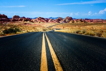 Fototapeta na wymiar Desert Highway Adventure: Scenic Southbound Road Leading to Arizona near Monument Valley, Captured in Breathtaking 4K Resolution