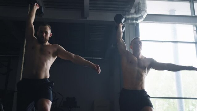 Two Bodybuilders Training With Heavy Weights In Gym, Hard Workout Of Professional Powerlifters