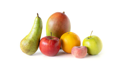fresh fruit group - apple green and red, pear, mango and orange, lie on a white table, isolated