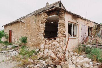 Countryside. A house destroyed by shelling. War in Ukraine