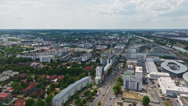 Drone shot of Wolfsburg city , Germany . It's known as the headquarters for Volkswagen and for the Autostadt, an automobile-themed park with a classic-car museum and driving track.