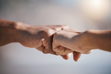 Man, hands and fist bump for teamwork, partnership or unity in solidarity or community in the...