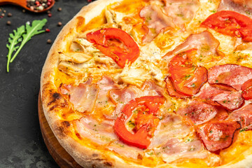 Hot pizza, Chopped pizza with four types of toppings, Food recipe background. Close up