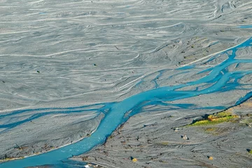 Crédence de cuisine en verre imprimé Aoraki/Mount Cook An aerial view of Glacier water from Mount Cook flowing through the Waiho River in Franz Josef, Southland, New Zealand. 