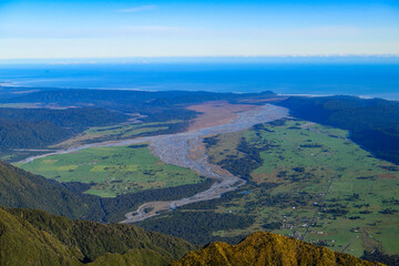 An Aerial view of Cook River looking over the Tasman Sea in New Zealand. 