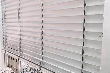 Large roller shutters with electric lift.