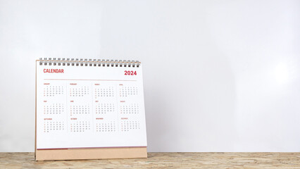 Calendar year 2024 schedule on wood table white background.
2024 calendar planning appointment...