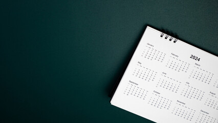 Calendar year 2024 schedule on green dark background.
2024 calendar planning appointment meeting...