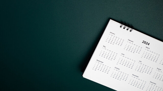 Calendar year 2024 schedule on green dark background.
2024 calendar planning appointment meeting concept. 
copy space.
top view.