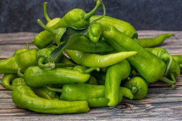 Green Peppers on a wooden table