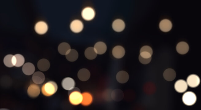 City lights of night bokeh abstract background ,Gold bokeh with black background
