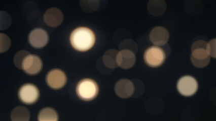 Bokeh black background captures a circle of yellow light bulbs, abstract