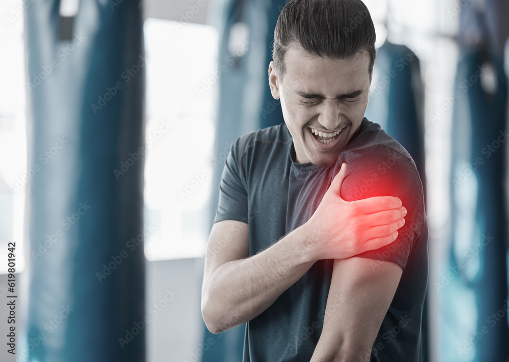 Canvas Prints Hand, shoulder pain and the arm of a man in red highlight during a fitness workout. Healthcare, medical and emergency with a male athlete holding his joint after an accident or injury in the gym