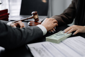 Lawyer accepts money, bribes businessman for partner in corruption in workplace.