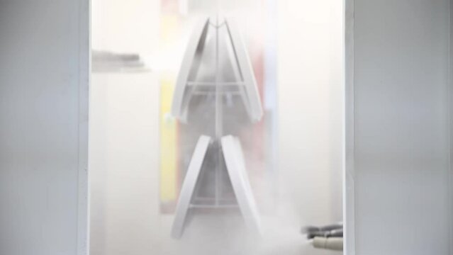 Powder coating line, painting products in an electrostatic field.