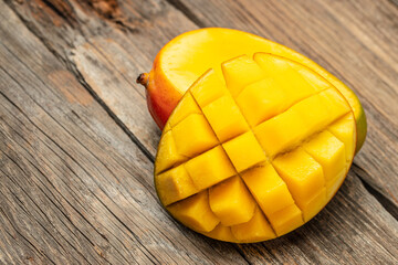 Mango. Fresh tropical fruit on a wooden background. place for text, top view