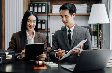 Team lawyer asian meeting working hard about legal legislation.