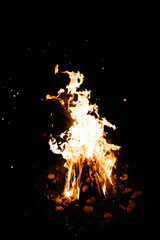 Fototapeta na wymiar fire flame close up on black background