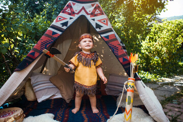 Cute Little Boy Dressed like Indian in Teepee Tent