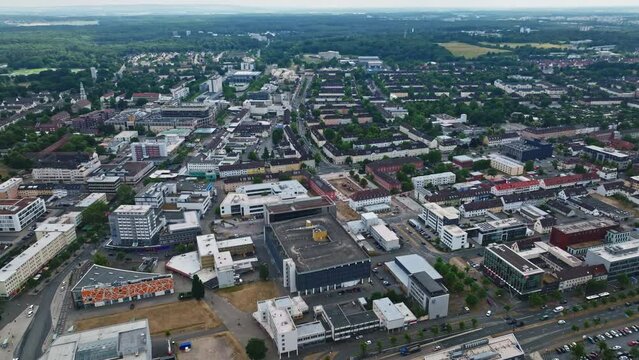 Drone shot of Wolfsburg city , Germany . It's known as the headquarters for Volkswagen and for the Autostadt, an automobile-themed park with a classic-car museum and driving track.