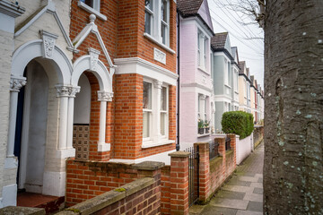 Fototapeta na wymiar Row of typical British terraced houses in south west London