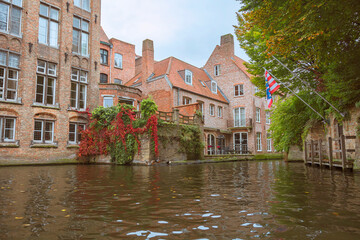 Bruges, Belgium. Historic center of the city. West Flanders Province, Belgium. Cityscape of Bruges (Brugge) with rozenhoedkaai canal.