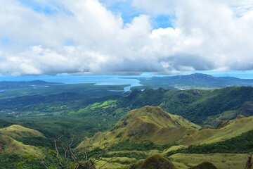 View from the top of the mountain to the mountain range, forest, rivers and Pacific ocean, in...